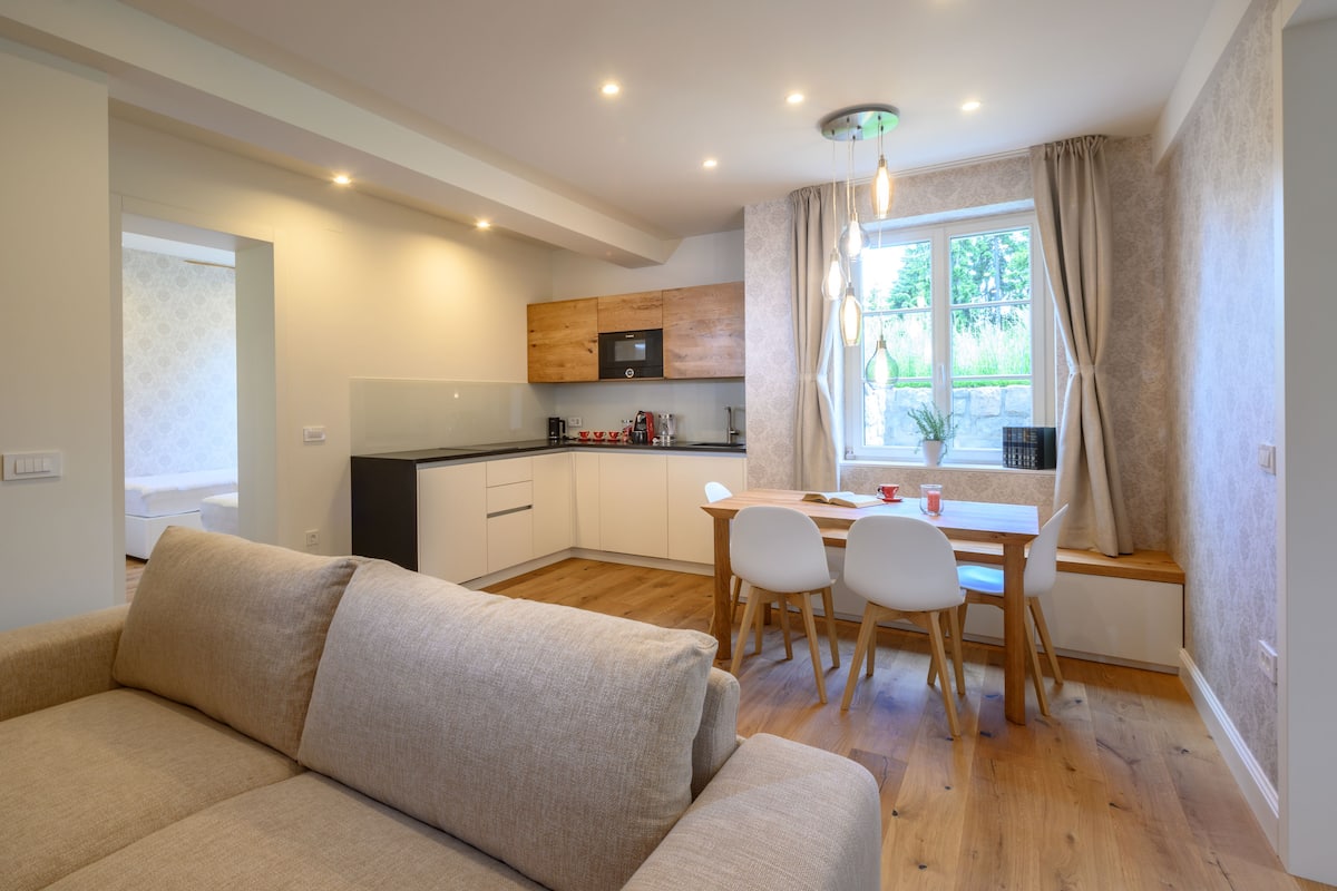 Luxury Apartment, Garden View | Living area | Smart TV, heated floors