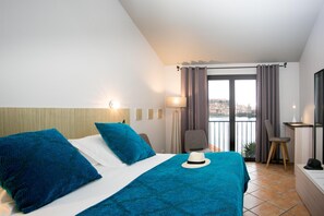 Ropa de cama de alta calidad, minibar, caja fuerte