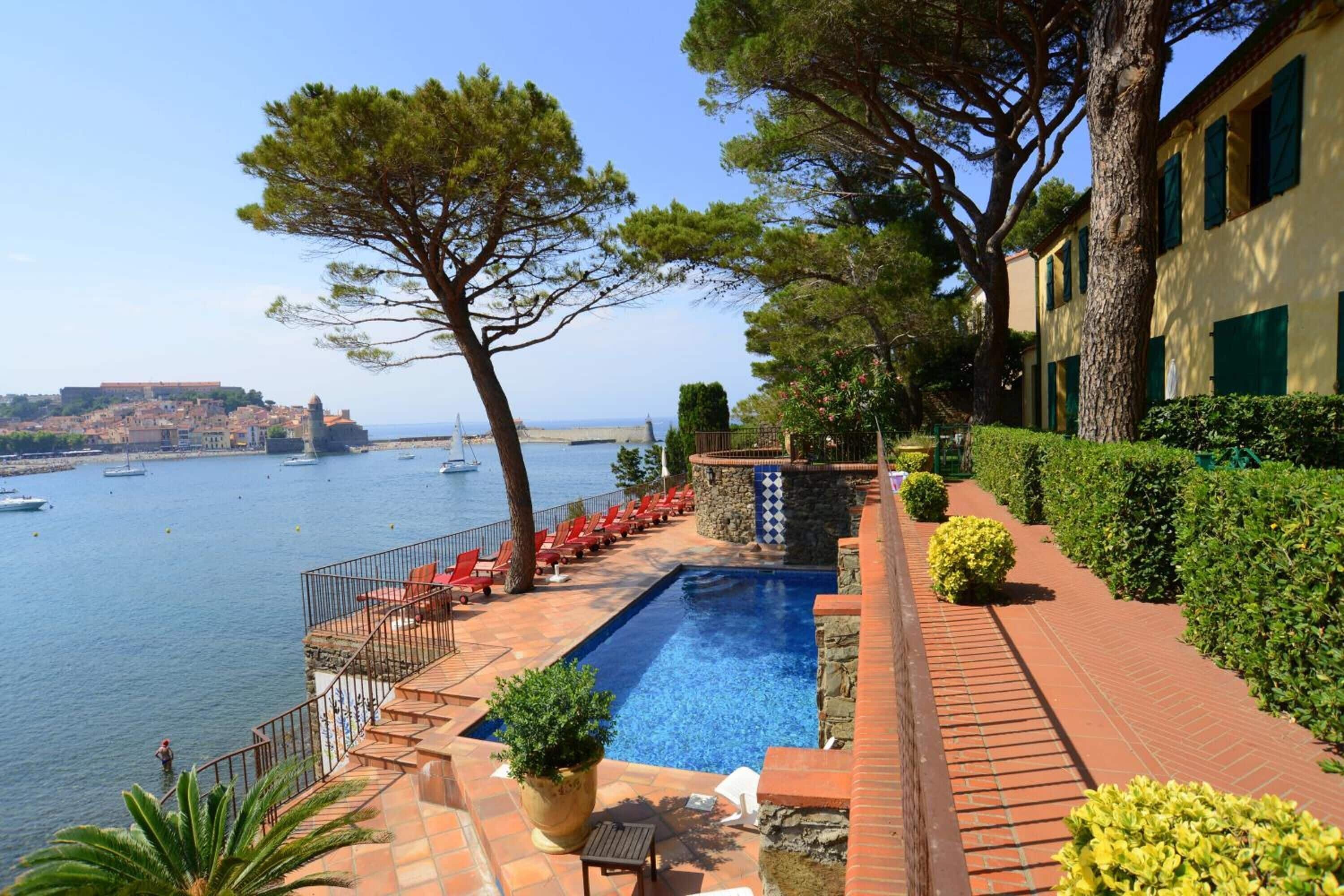 seasonal outdoor pool, pool umbrellas, pool loungers