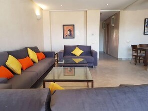 Luxury Villa | Living area | 45-inch flat-screen TV with satellite channels, TV, fireplace