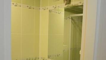 Eco-friendly toiletries, hair dryer, slippers, towels