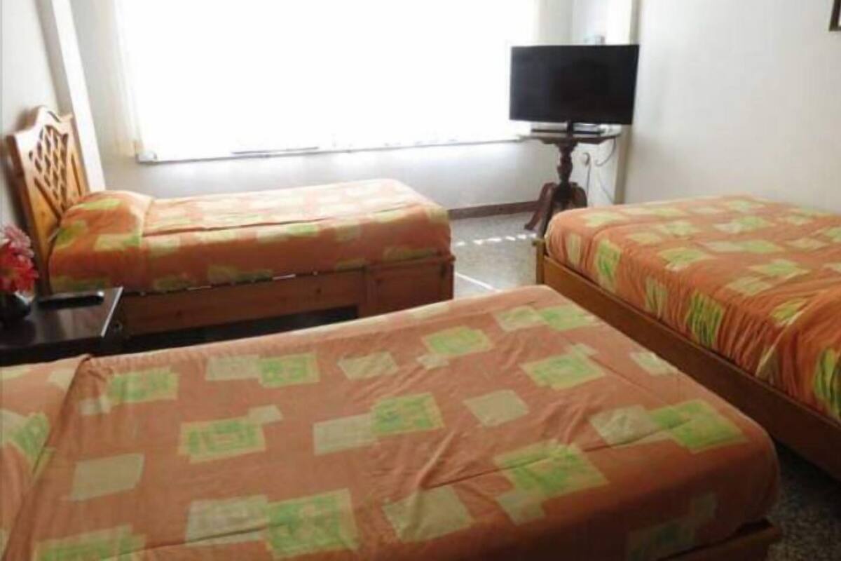 Family Apartment | Down comforters, iron/ironing board, rollaway beds, free WiFi
