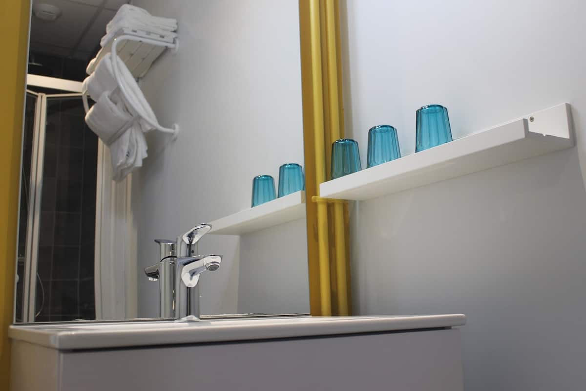 shower, eco-friendly toiletries, hair dryer, towels