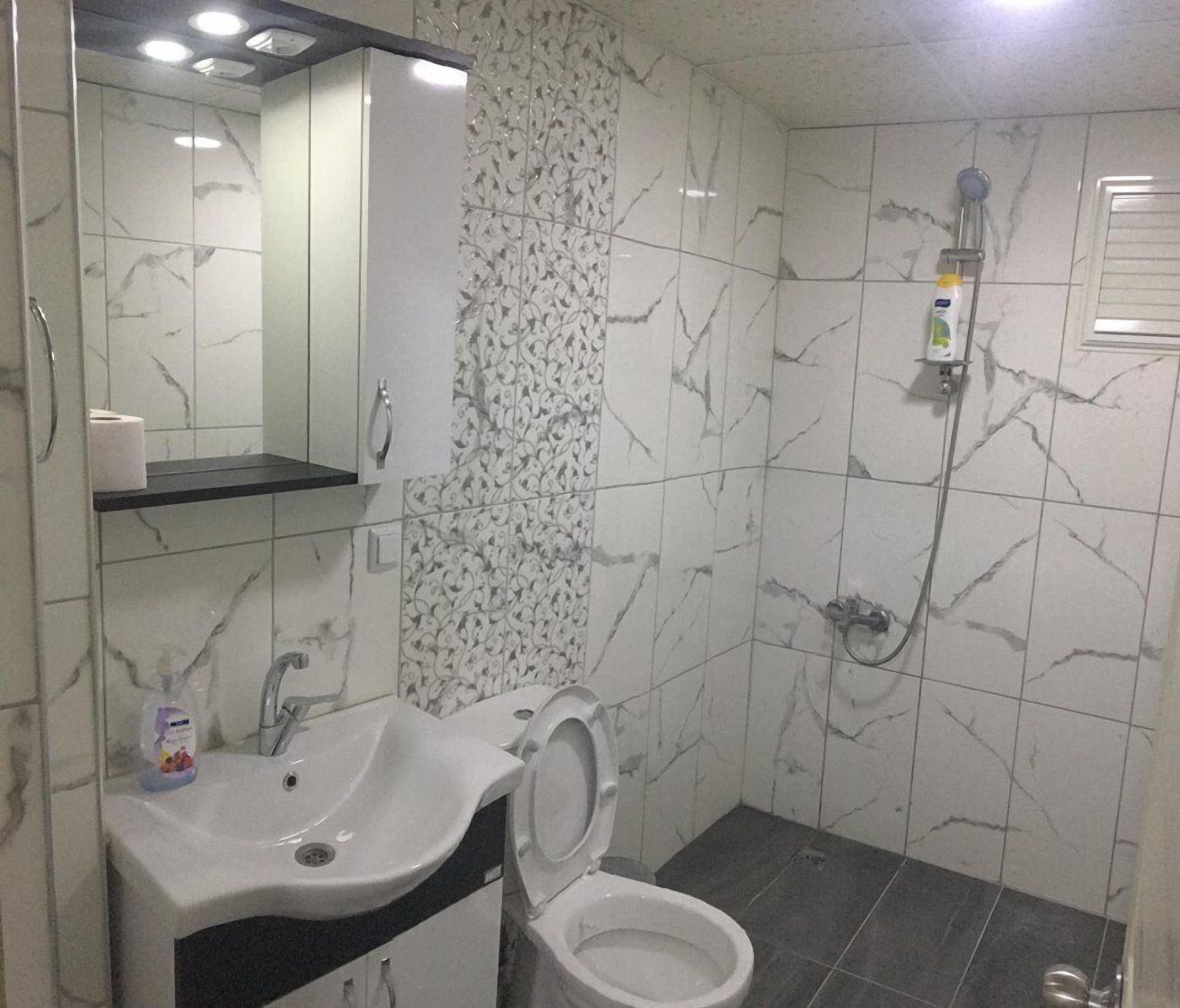 Shower, free toiletries, hair dryer, slippers