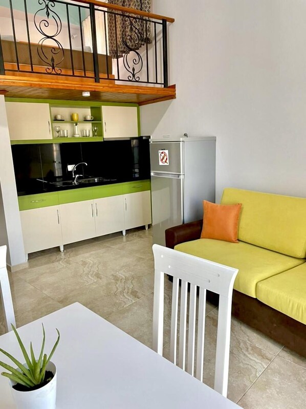 Studio, Sea View | Living area | Plasma TV