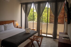 Premium bedding, blackout curtains, free WiFi, bed sheets - Hotel Muyu Tulum (Tulum)