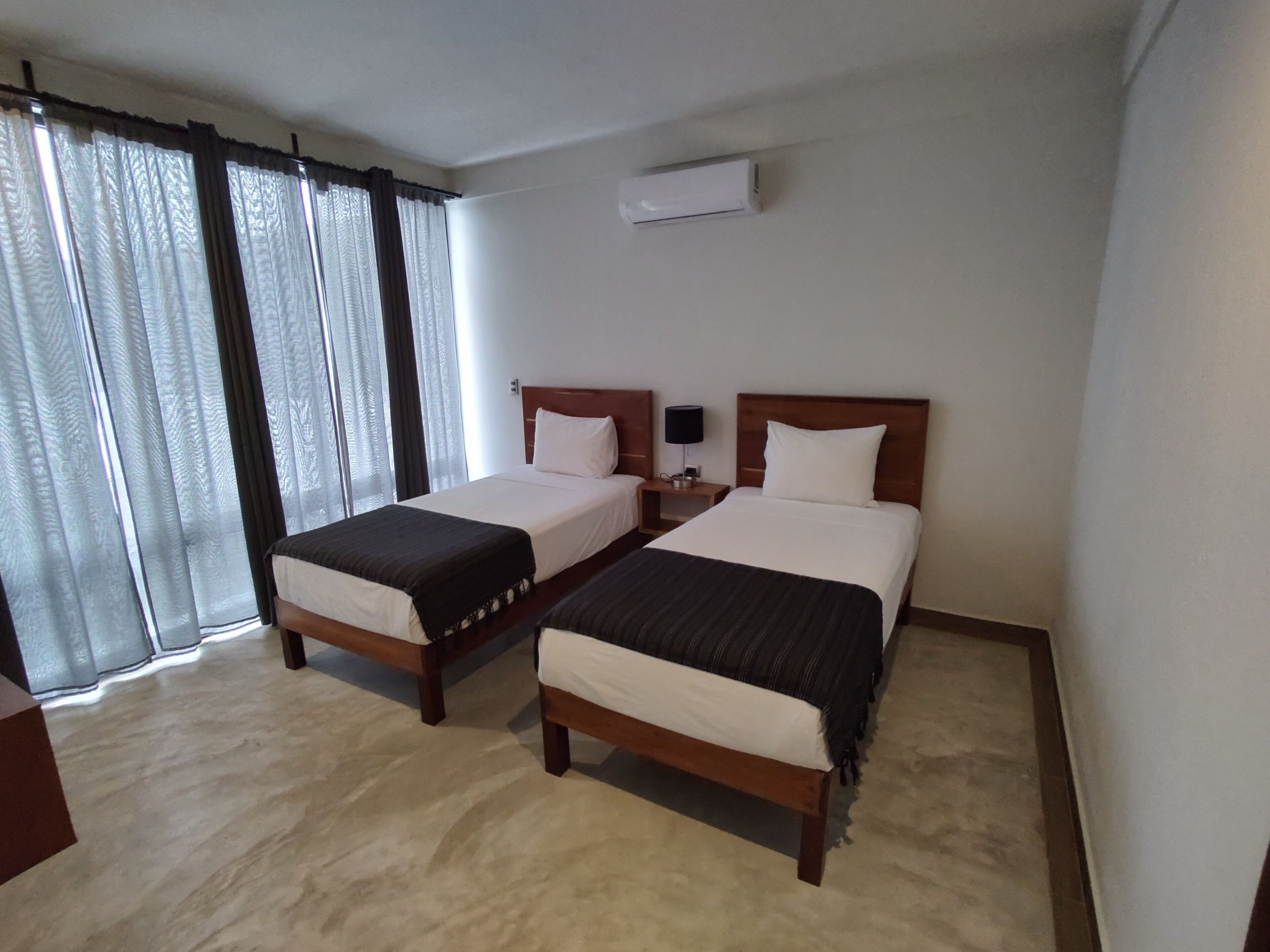 deluxe twin room | premium bedding, blackout curtains, free wifi, bed sheets