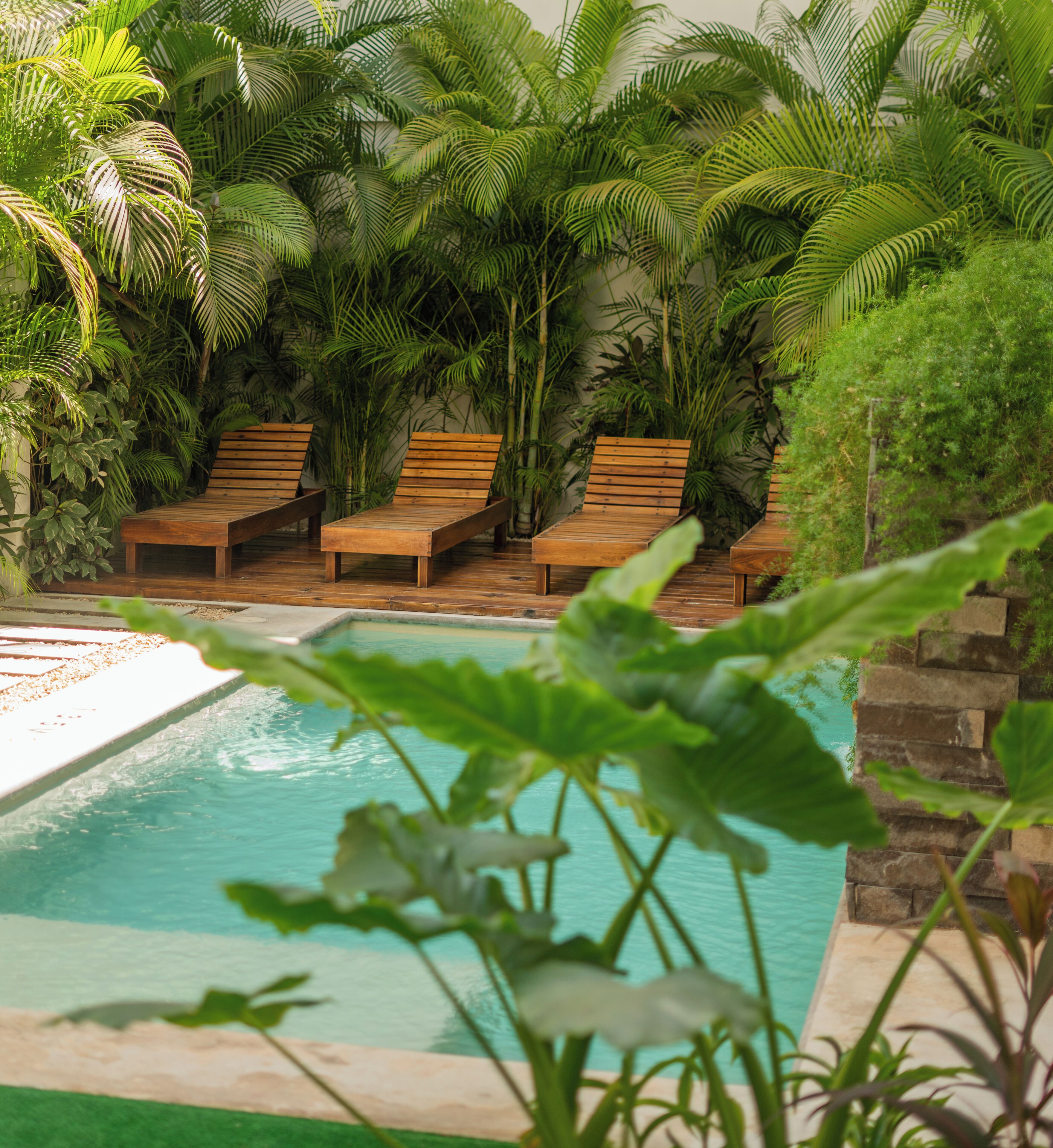 Outdoor pool, open 9:00 AM to 7:00 PM, pool loungers