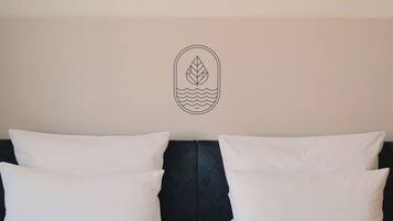 Hypoallergeen beddengoed, een kluis op de kamer, een bureau