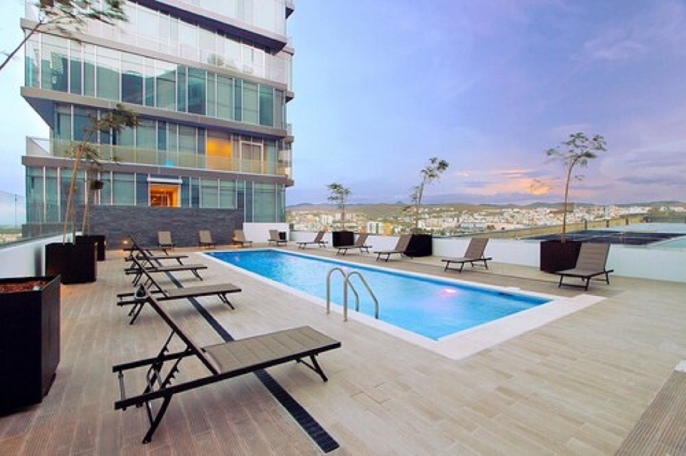 Outdoor pool, open 9:00 AM to 6:00 PM, pool umbrellas, sun loungers