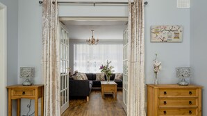 Cottage | Living area | Flat-screen TV, fireplace, books - Strelna Coach House - Gateway to the Moor (Newton Abbot)