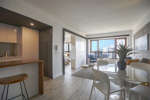 Apartment, 1 Bedroom | Living area | 32-inch Smart TV with cable channels, TV