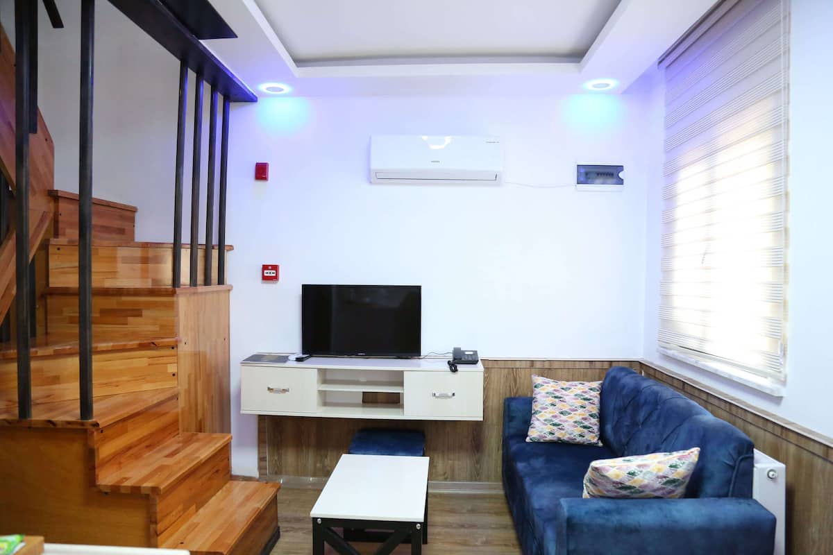 Superior Duplex, 2 Bedrooms | Living area | LCD TV