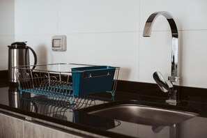 Departamento, 1 habitación | Cocina privada | Refrigerador con congelador, microondas, horno y parrilla de estufa 