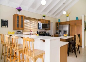 Fridge, microwave, oven, cookware/dishes/utensils