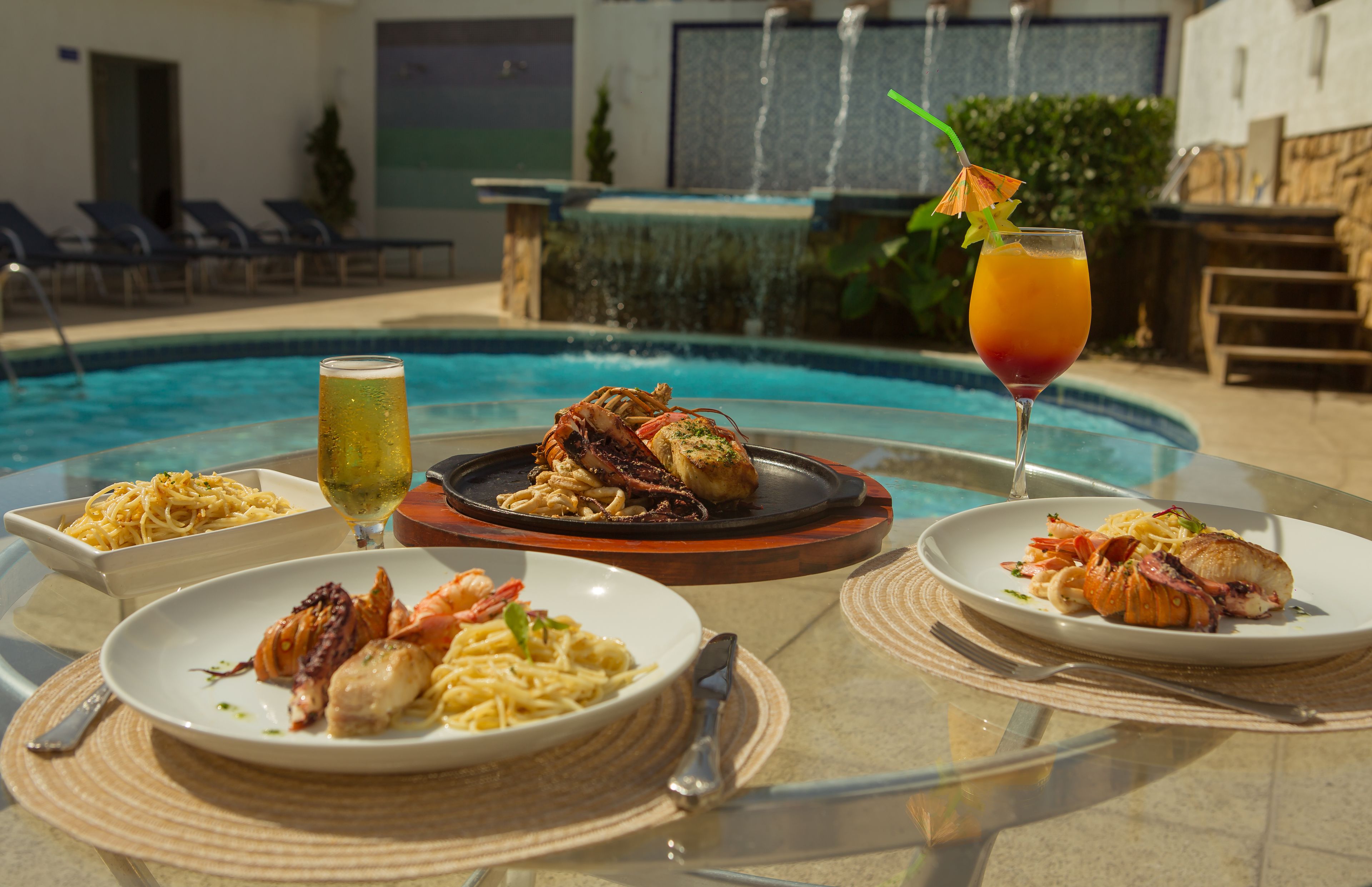 2 outdoor pools, pool umbrellas, pool loungers