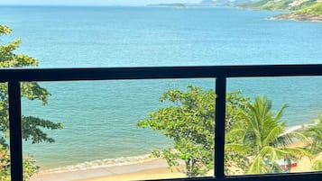 Quarto luxo, sacada, vista para o mar | Varanda coberta