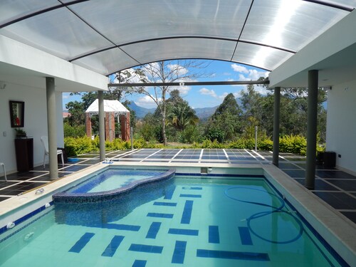 Recreation house in temperate climate condominium. Country