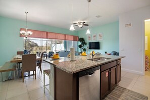 House | Private kitchen | Stovetop, dishwasher, cookware/dishes/utensils - 3BR Townhome in  Festival (Davenport)