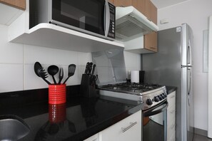 Apartment, 2 Bedrooms | Private kitchen | Full-size fridge, microwave, oven, stovetop