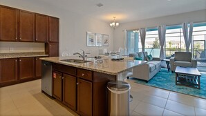 House | Private kitchen | Stovetop, dishwasher, cookware/dishes/utensils - 4BR Townhome in Festival (Davenport)