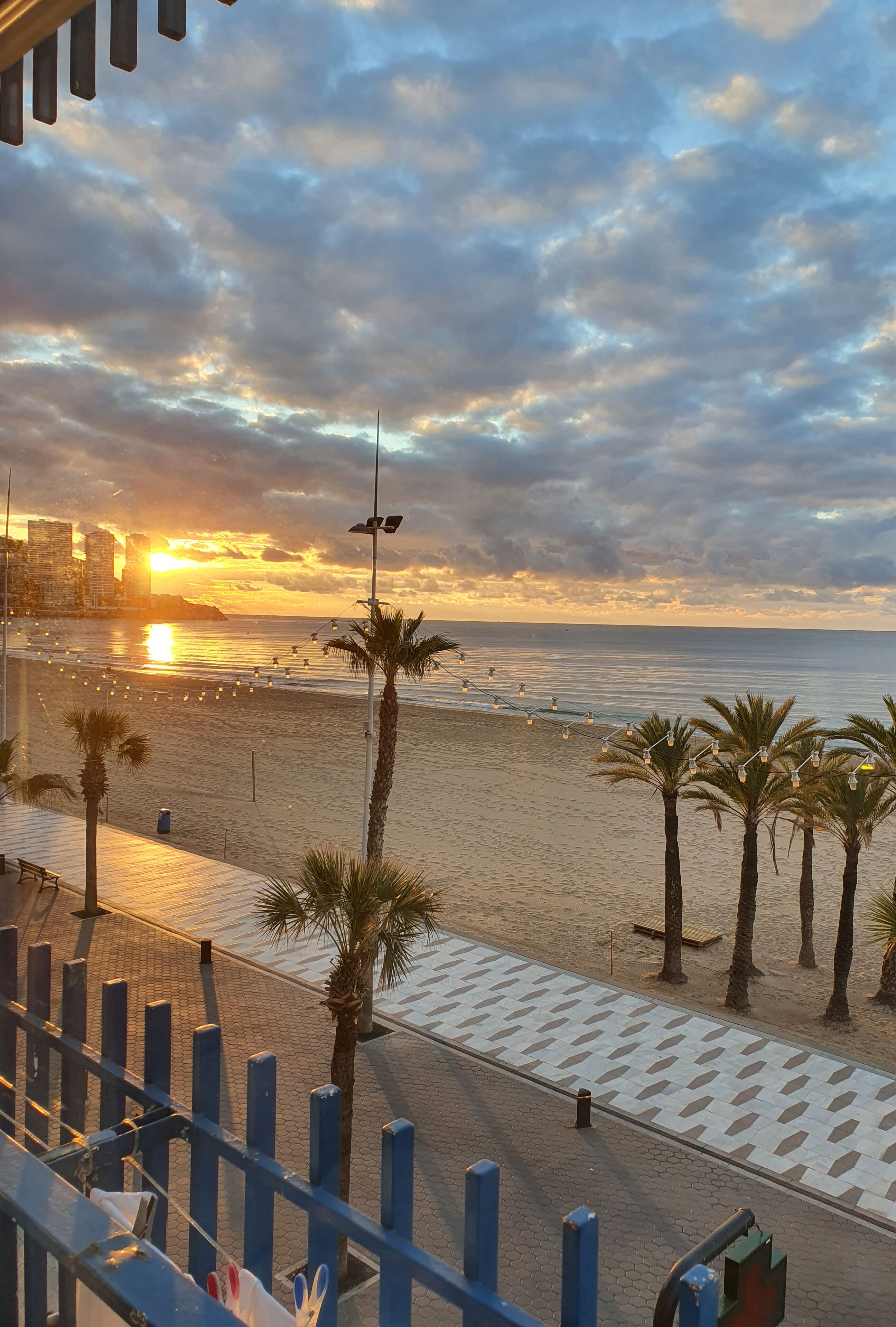 On the beach, sun loungers, beach towels