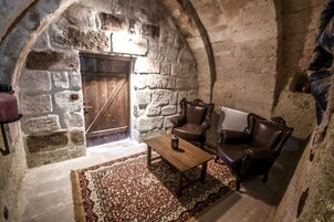 Superior Cave Room | Living area | 43-inch LCD TV with satellite channels