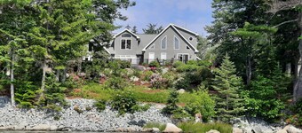 Enjoy a secluded shoreline home mid-way between the 2 parts of Acadia Natl Park!