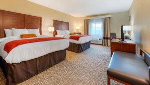 A hotel room with two beds, a desk, a chair, and a window with curtains. - Comfort Inn & Suites Michigan City South (Michigan City)