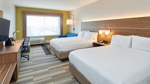 A hotel room with two beds, a desk, a chair, a TV, and a window with a view. - Holiday Inn Express & Suites Taylor by IHG (Taylor)