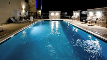 Outdoor pool, open 10:00 AM to 10:00 PM, pool loungers