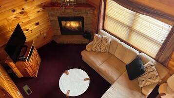 Télévision, cheminée, lecteur de DVD