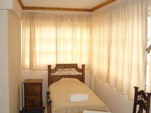 Habitación individual estándar | 15 dormitorios, cortinas opacas, tabla de planchar con plancha