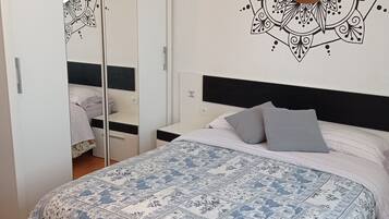 2 dormitorios, tabla de planchar con plancha, wifi y ropa de cama