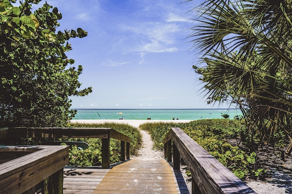 Beach nearby, beach umbrellas, beach towels