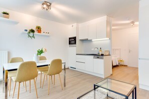 Apartemen Deluks | Area keluarga | TV layar datar