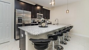 House | Private kitchen | Coffee/tea maker, fridge, microwave, oven - 4BR 3BA Town Home in Champions Gate (Davenport)