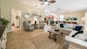 Living room - 5BR Pool Home In ChampionsGate (Davenport)