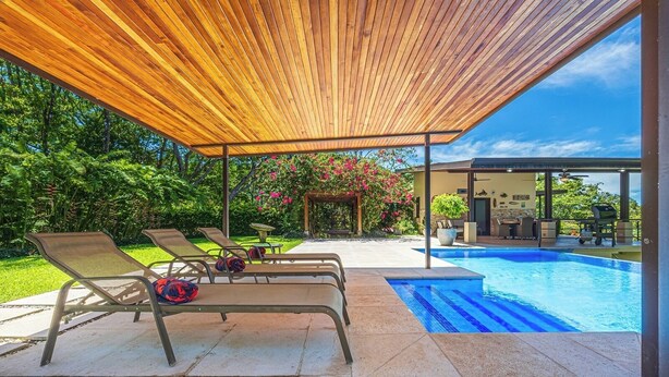 A covered outdoor area with a pool, lounge chairs, and a pergola. - Don Pedro-Perfect for Couples & Families, Onsite Staff. (Savegre de Aguirre)