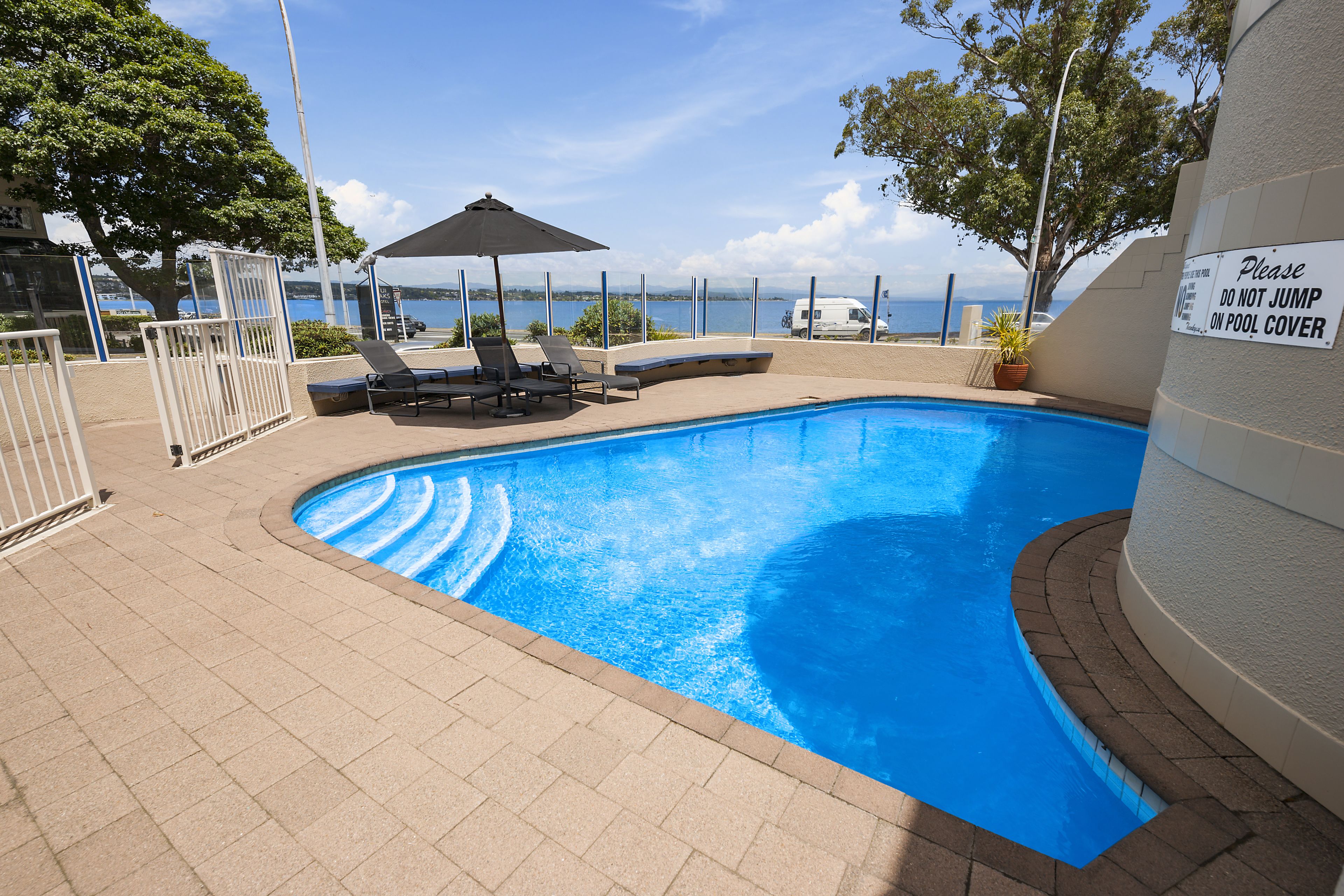 Outdoor pool, a heated pool, sun loungers