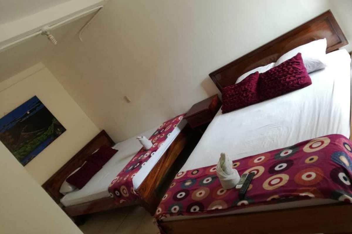 Quadruple Room, Pool View | Minibar, free WiFi, bed sheets