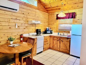 Full-size fridge, microwave, oven, stovetop - Tranquil Cabin- Perched on Mountain Top boasting jacuzzi for two and expansive deck with views! Trail & Cave on Property! (Eureka Springs)