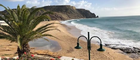 On the beach, sun-loungers, beach towels