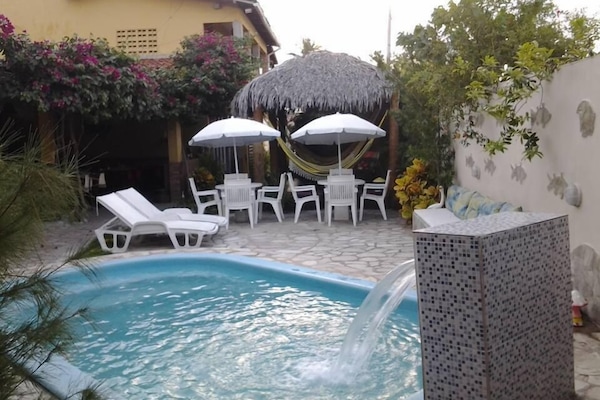 Outdoor pool, a waterfall pool