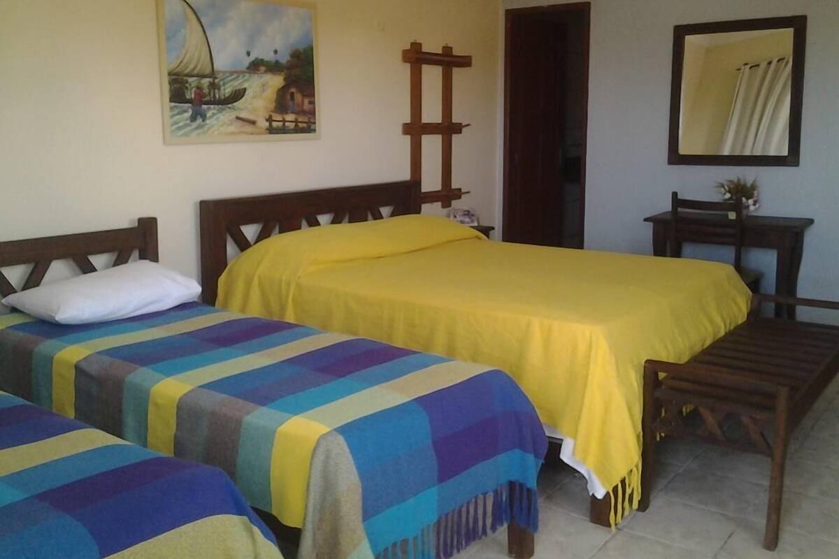 Kamar Quadruple | Minibar, tirai kedap cahaya, setrika/meja setrika, dan Wi-Fi gratis