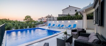 Modern Villa Future**** with an outdoor heated pool in a quiet village on Krk