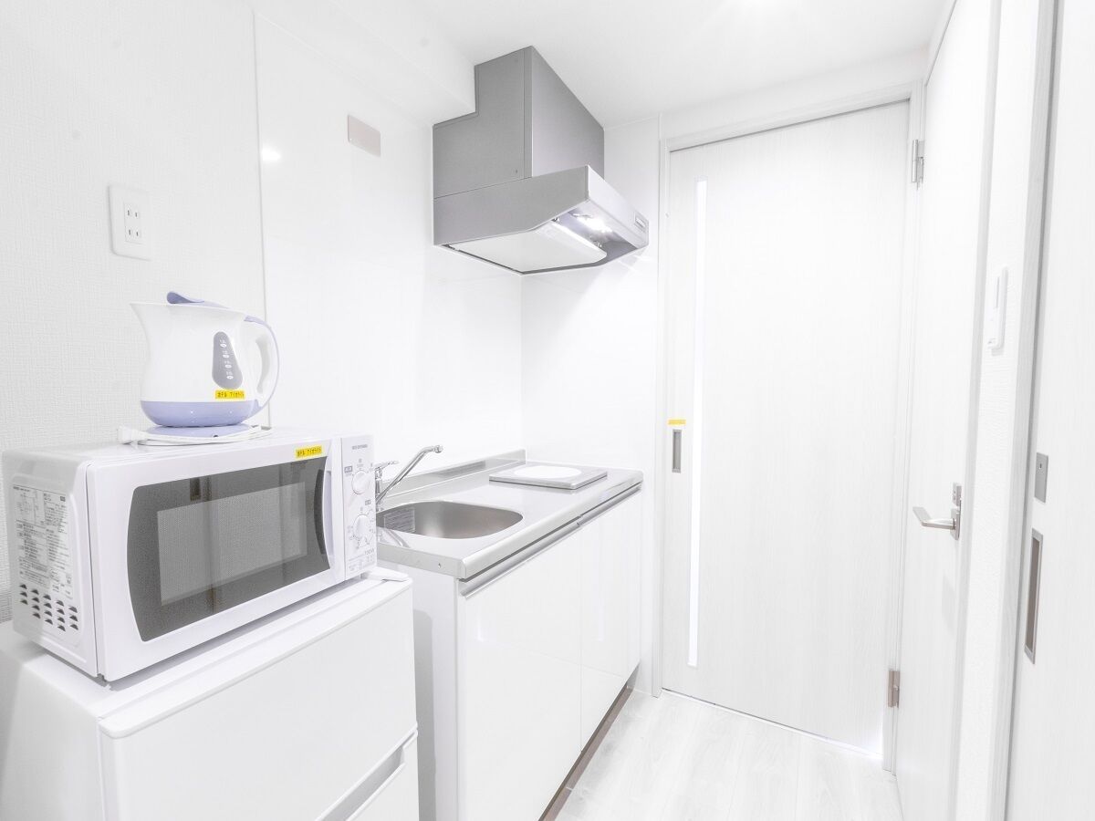 fridge, microwave, stovetop, electric kettle