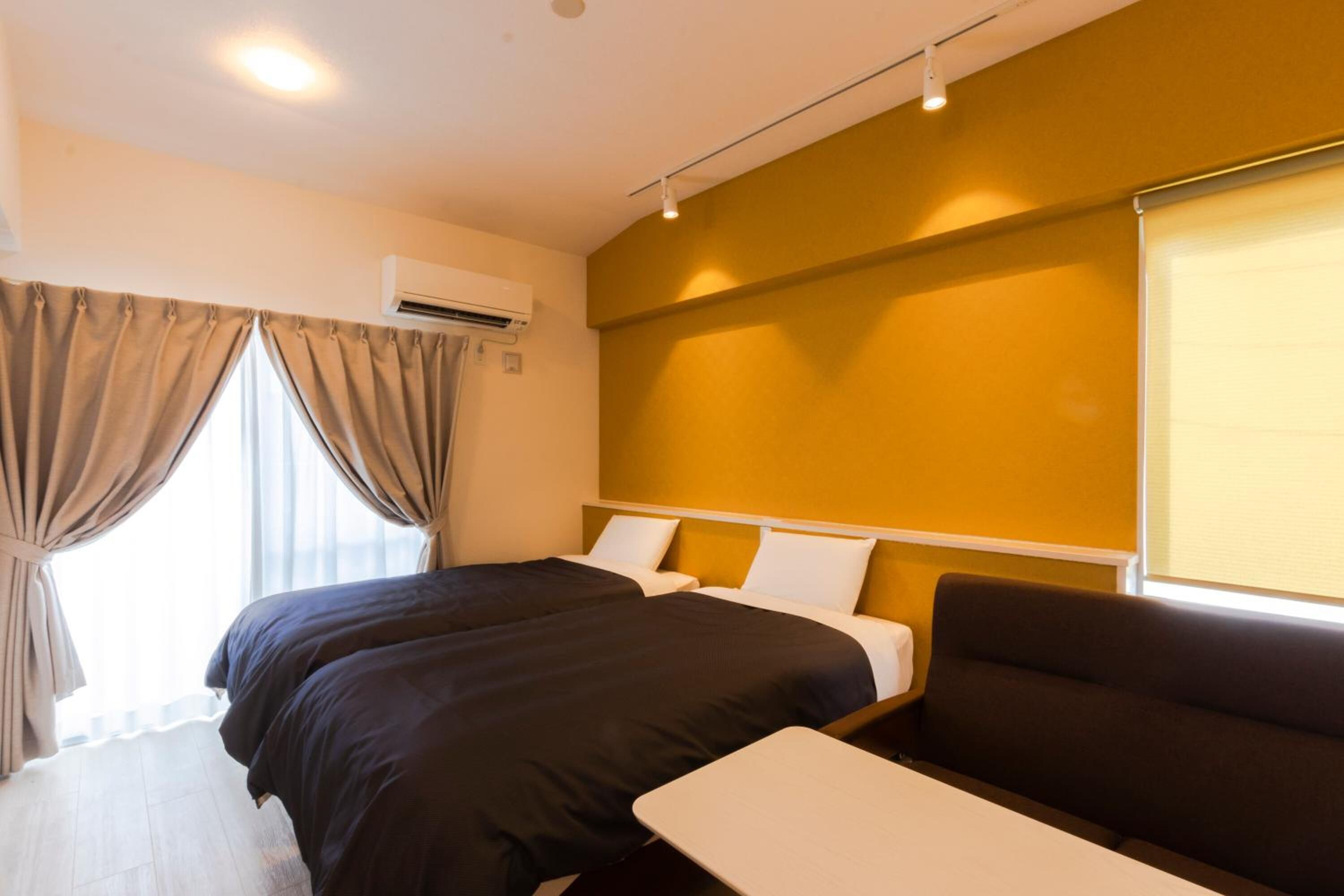 blackout curtains, soundproofing, free wifi, bed sheets