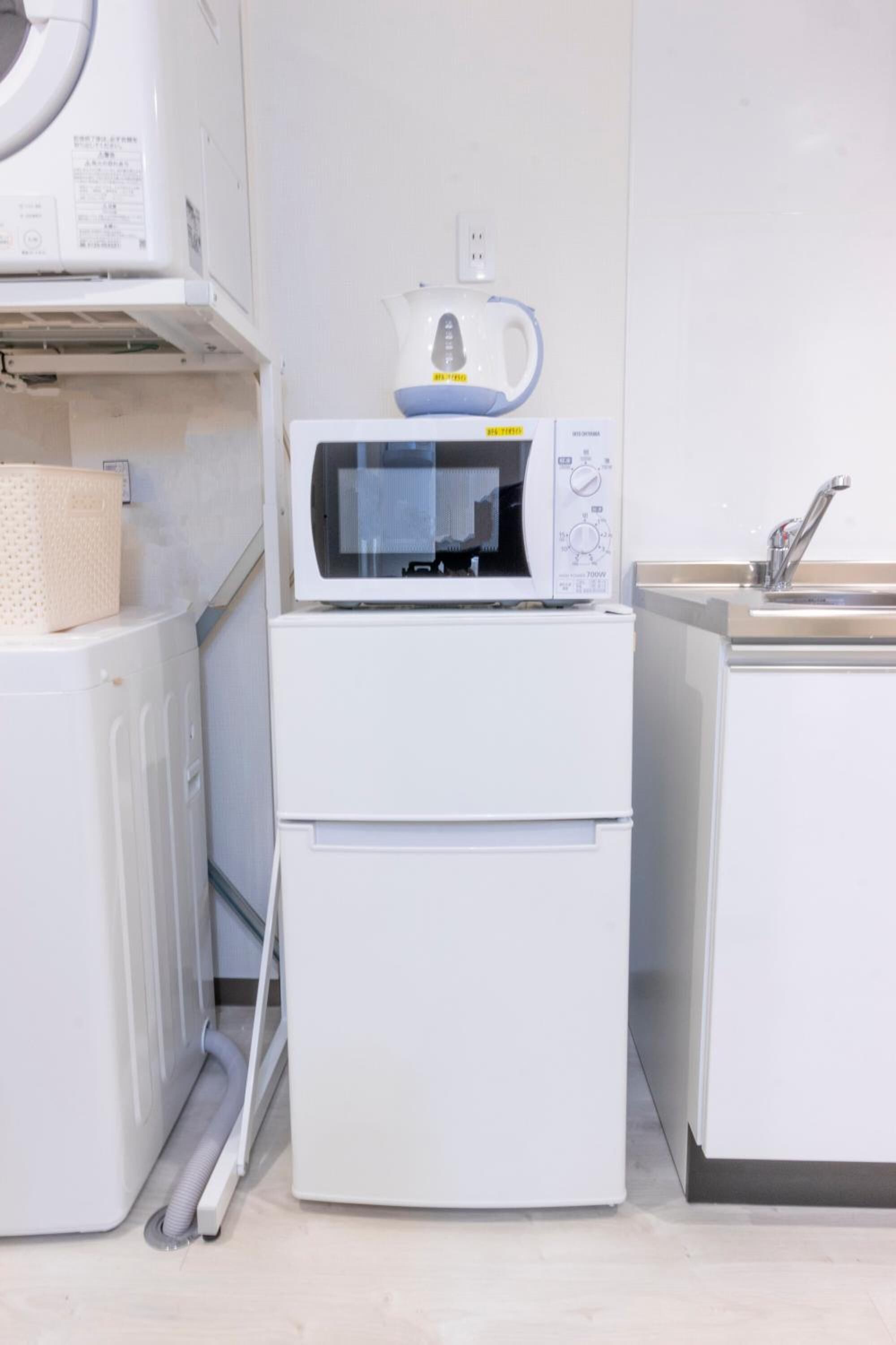 fridge, microwave, stovetop, electric kettle