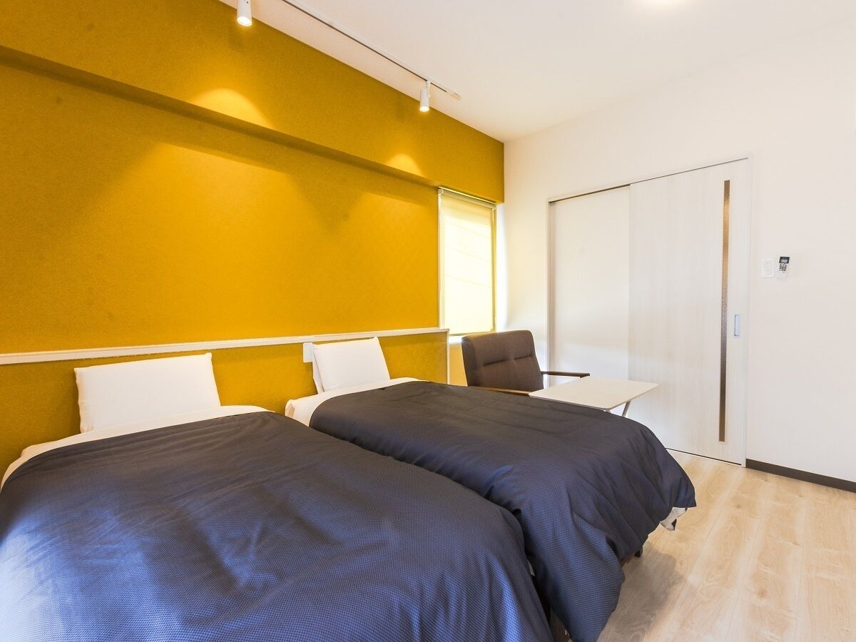 basic twin room | blackout curtains, soundproofing, free wifi, bed sheets